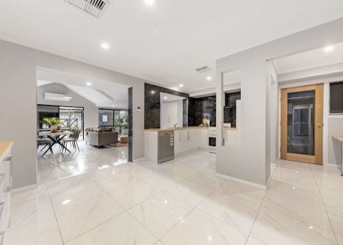 Bright open-plan kitchen, living and dining after renovation