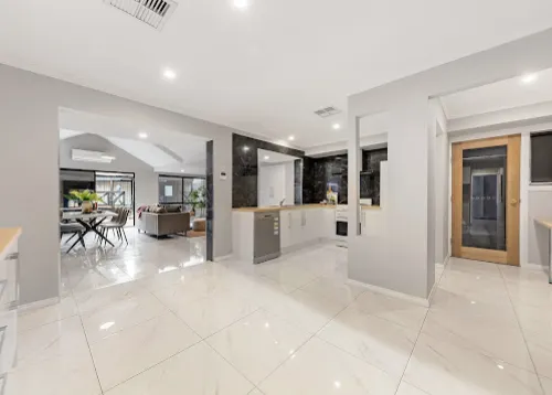Bright open-plan kitchen, living and dining after renovation